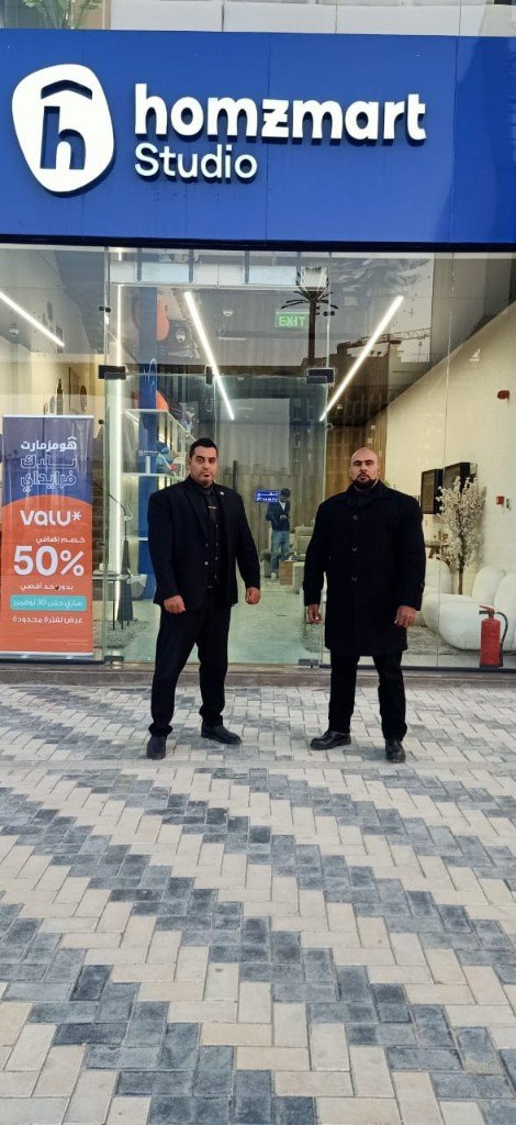 Golden Guard retail security guards at homzmart Studio storefront Egypt