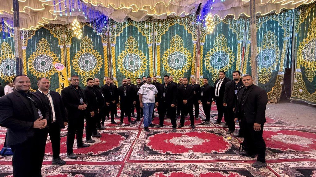 Golden Guard security personnel team at Egyptian traditional event tent