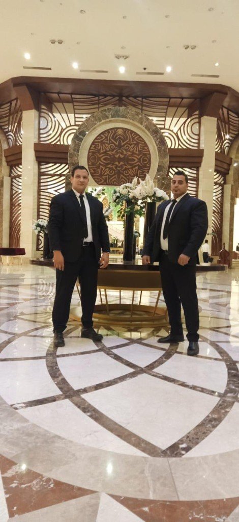 Golden Guard security team guarding luxury hotel lobby entrance